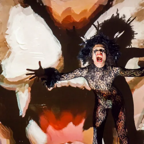 Multimedia artist and educator Yuliya Lanina in costume during her performance of Misread Signs